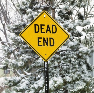 Snowy road sign.