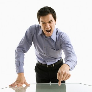 Businessman yelling.